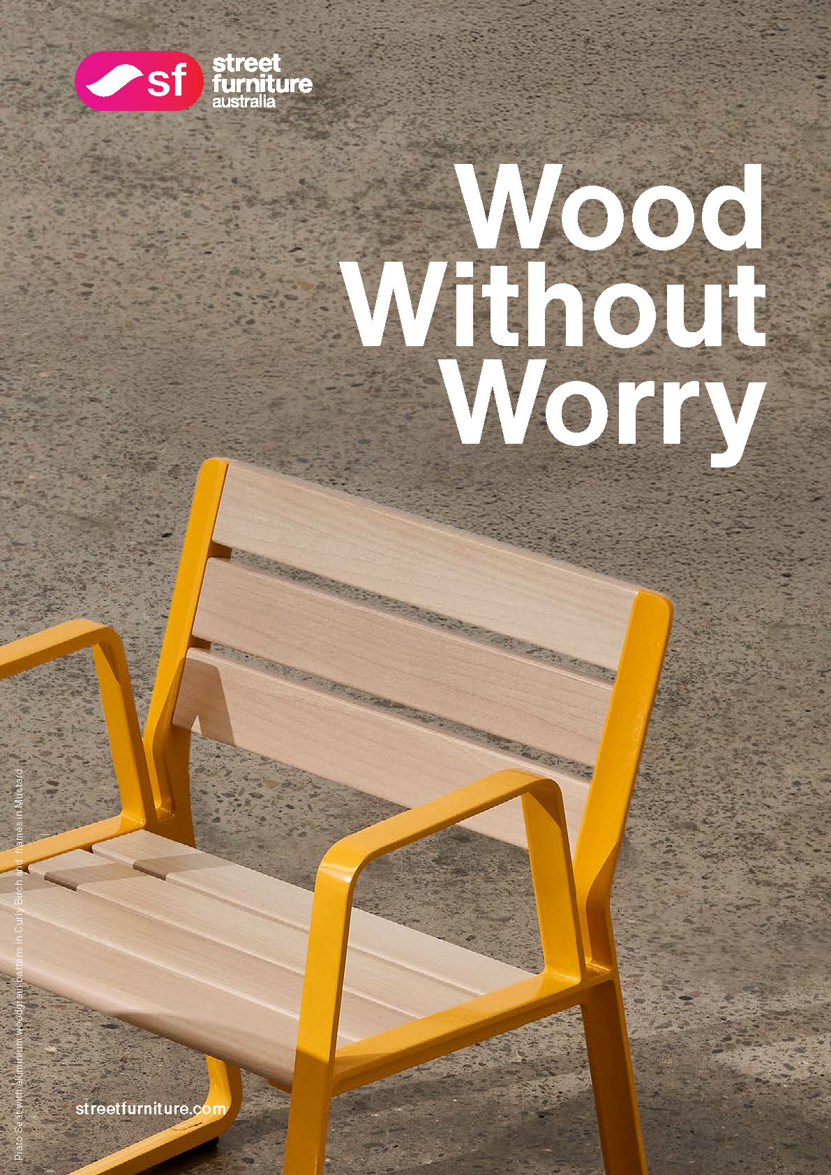Advertisement for Street Furniture Australia: 'Wood Without Worry' with a wooden bench and yellow metal frame on a concrete surface.