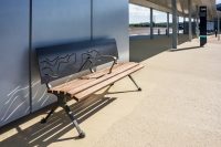 Mall DDA Seat (CMM7) with custom backrest in Monument, Jarrah battens and Woodland Grey frame.