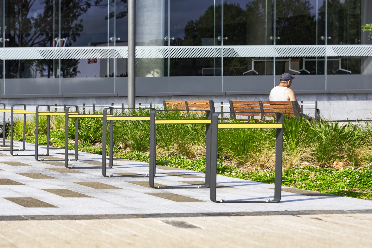 Linea Bicycle Stand (BST07) in Textura Monument with Brilliant Yellow insert.