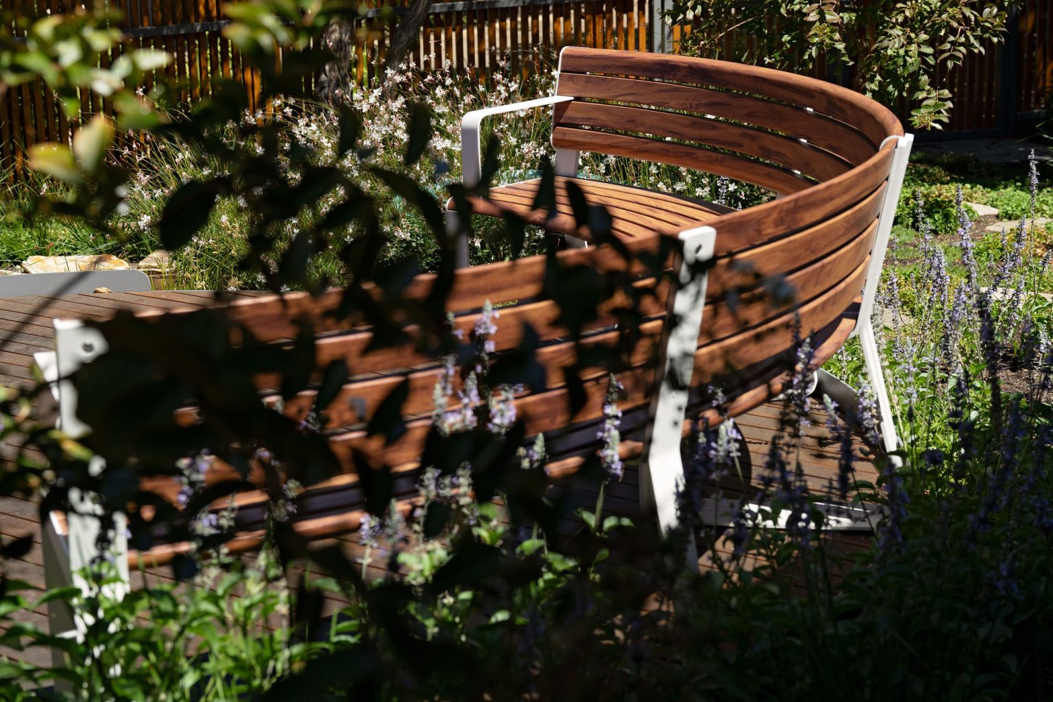 Linea Curved Seats in Textura Surfmist, Wood Without Worry battens in Spotted Gum.