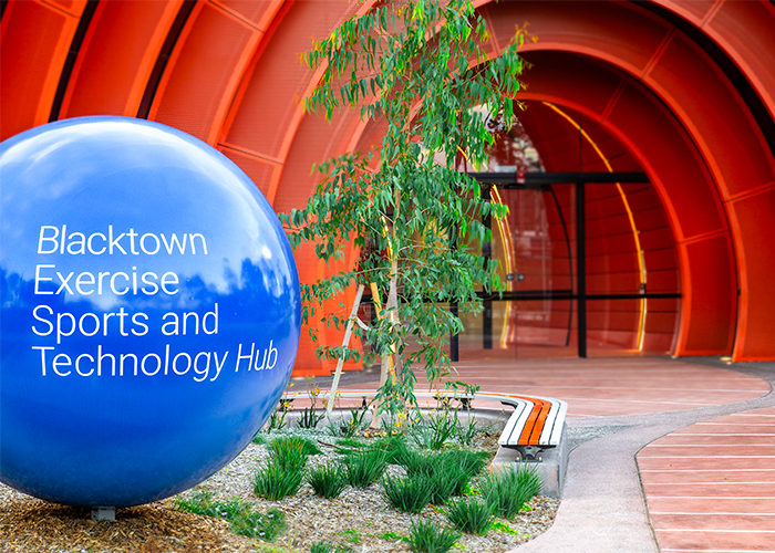 Mall Slim Bench, curved (CMM8-C) and straight (CMM8) plinth-fixed with Textura Silver and Sensation Orange battens, Charcoal frame.