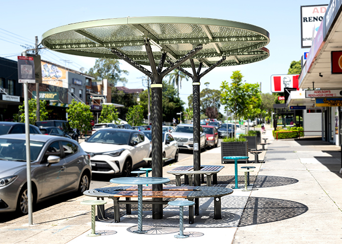 ChillOUT Tree (CT1) Bundle 3, powered, with flat circular roof in Textura Woodland Grey and Champagne perforated panels in Pale Eucalypt Green.