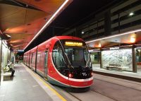 Canberra Metro station at night, with custom seats.