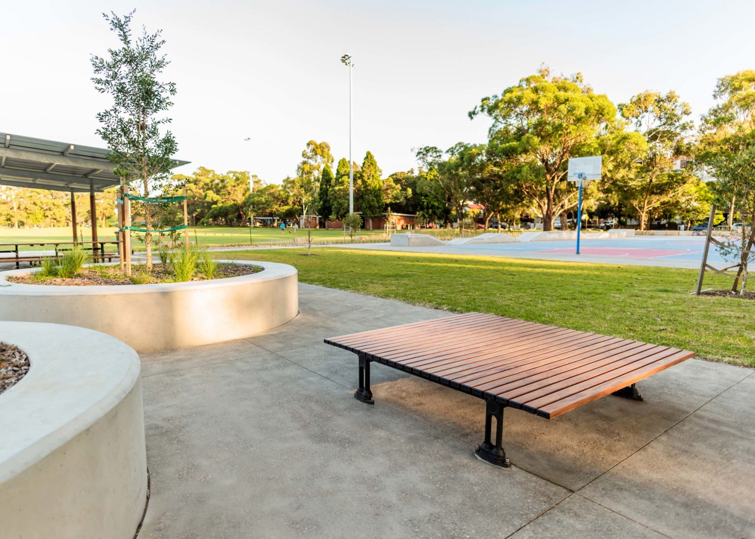 Mall Platform (CMM9) with aluminium woodgrain battens in Spotted Gum, Textura Monument frame.