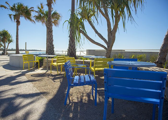 Forum Seats and Cafe Tables in Bondi Blue, Brilliant Yellow and Palladium Silver.