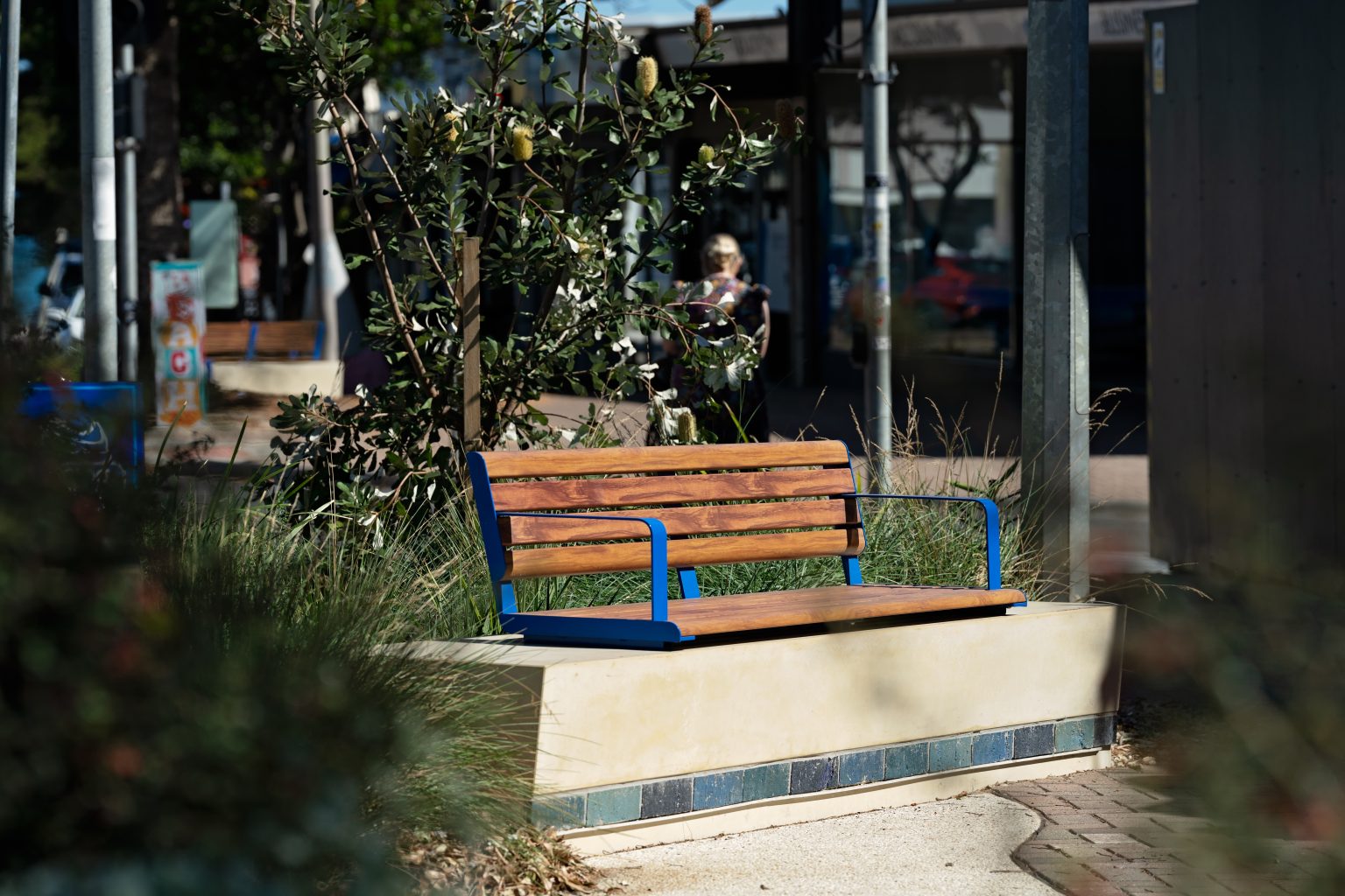 Linea Seat plinth-fixed with aluminium Spotted Gum battens, Jaybird Blue frames.