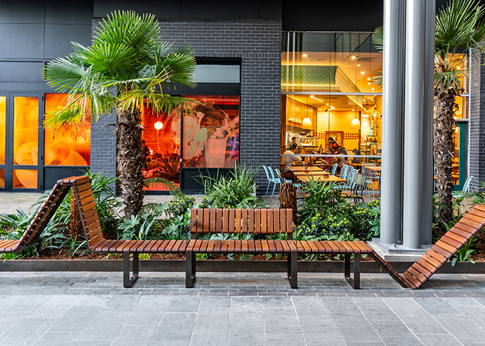Tailored VT seating system with Spotted Gum hardwood battens, Textura Dark Bronze frame.