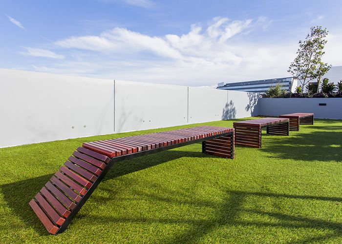 Bespoke furniture adorns the rooftop park.