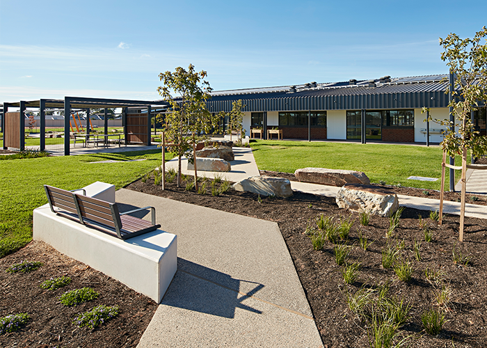 Linea Seat (LIS10, 1800) plinth-fixed with aluminium Bush Cherry battens, Textura Monument frame.