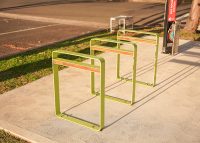 Linea Bicycle Stand (BST07) with aluminium Spotted Gum insert, Lycra Strip Green frame.