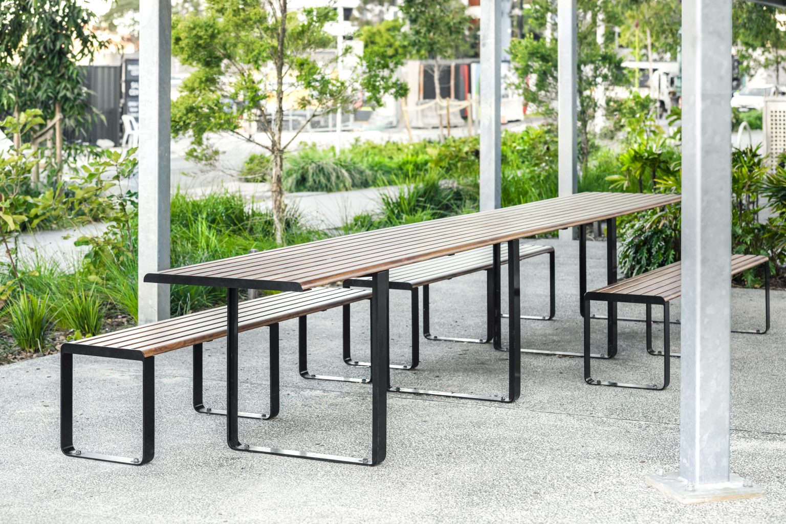 Linea Long Communal Table Setting, tailored DDA (wheelchair end-access) with aluminium Spotted Gum battens, Night Sky frames. Image: Eva Shaw Photography