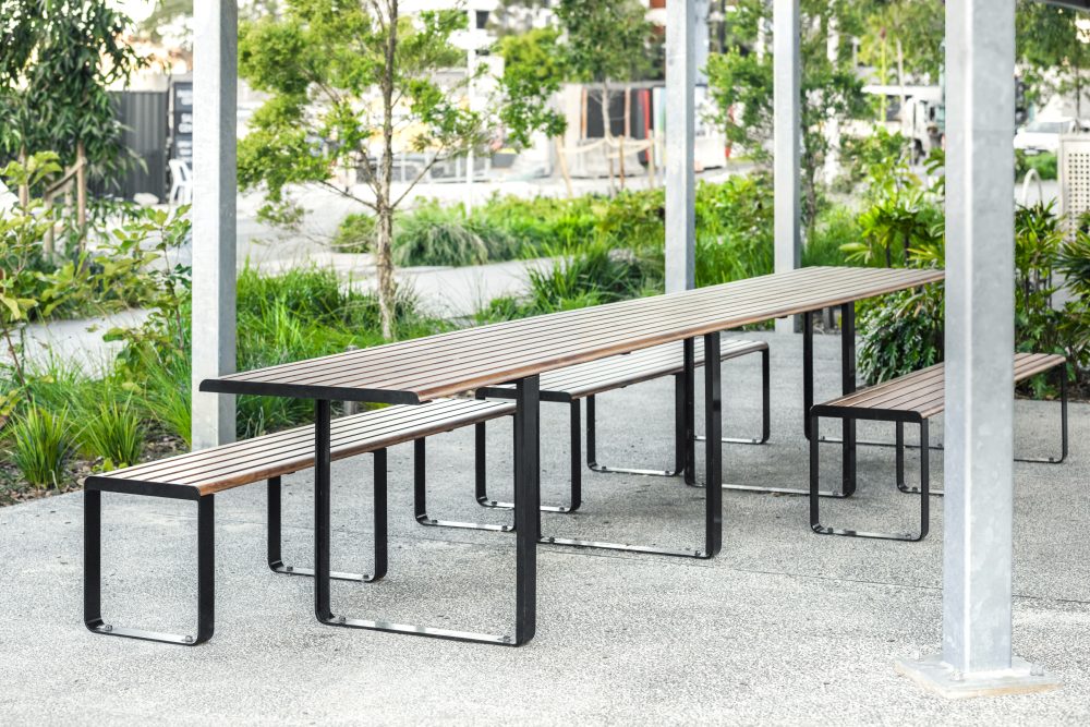 Linea Long DDA Table Setting (wheelchair end-access) with aluminium Spotted Gum battens, Night Sky frames. Image: Eva Shaw Photography