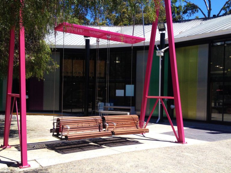 Custom Plaza Back-to-back Swing Seat | Photo courtesy of Tim Hart, Urban Initiatives