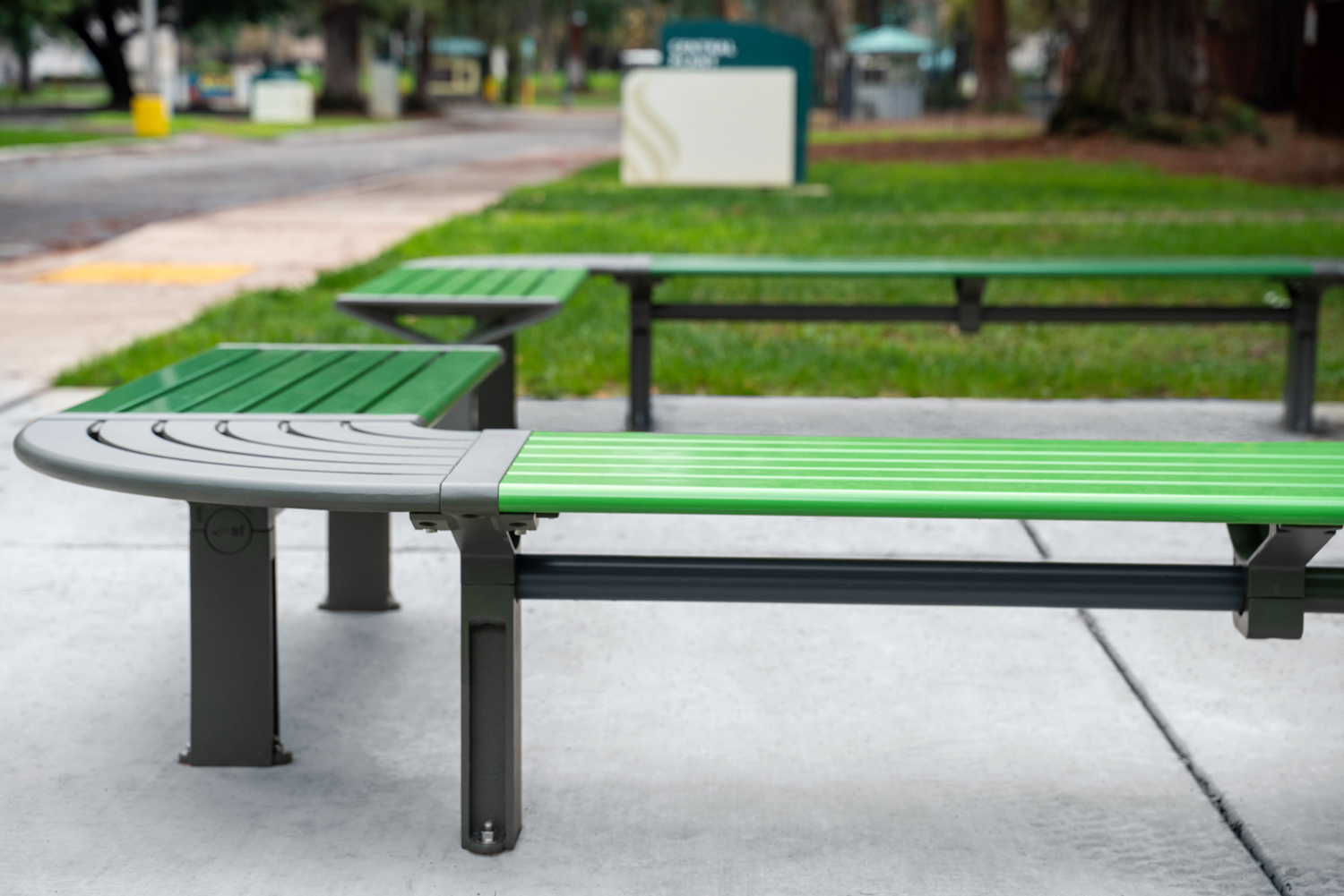 Aria Seating System (CMA4-2B-C90-3B-C90-2B) with Pedestal leg, Shamrock and Viper Green battens, Woodland Grey frames.