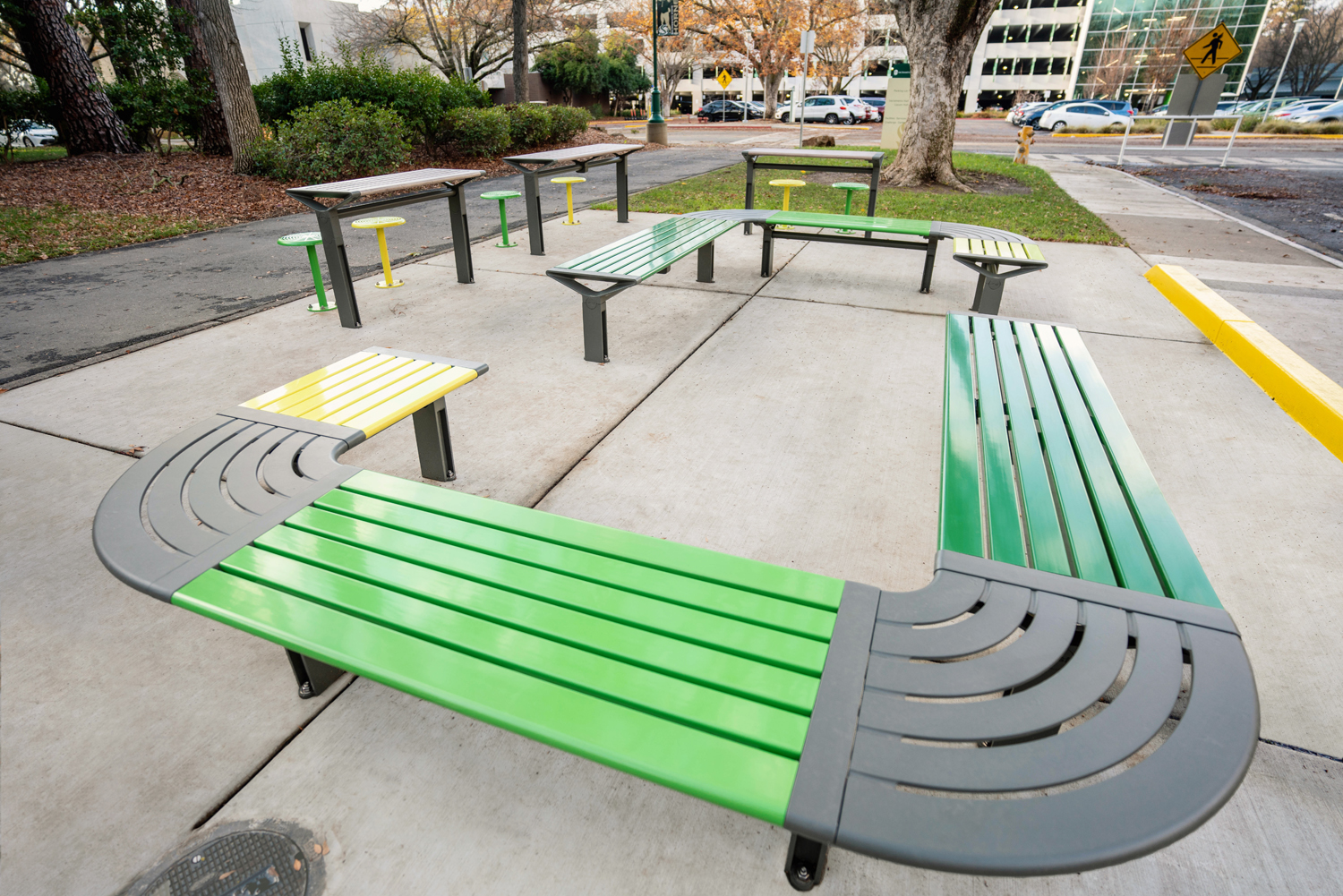 Aria Seating System (CMA4-1B-C90-2B-C90-3B) with Pedestal leg, Shamrock and Viper Green battens, Woodland Grey frames.
