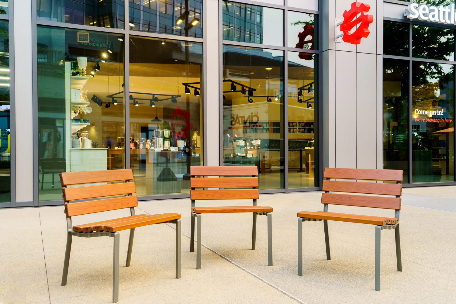 Forum Seats in aluminium woodgrain Bush Cherry, with Woodland Grey frames.