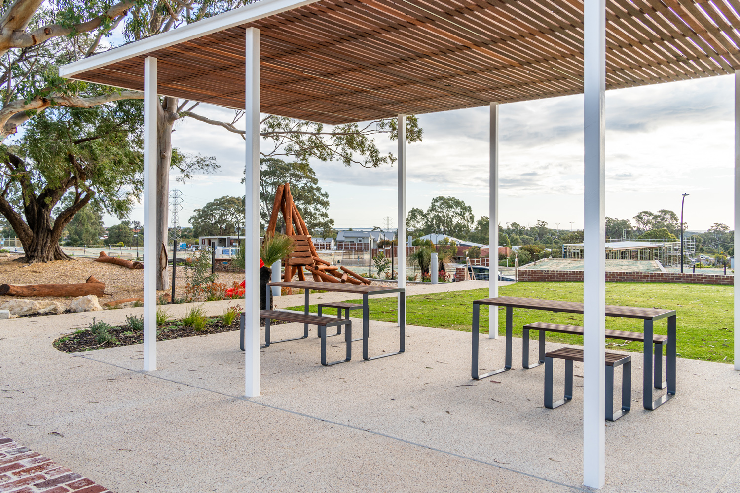 Linea Setting with Table (LIT10-DDA, 1800mm) and Benches (LIB6) with hardwood battens, Ironstone frame.