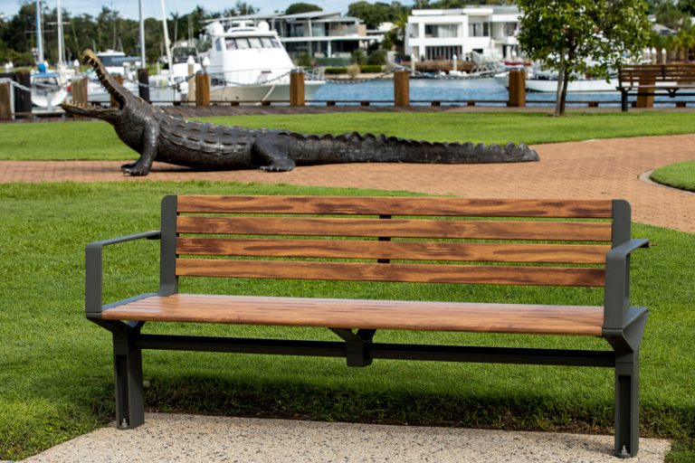 Aria Seat (CMA1) 3-seater with battens in aluminium woodgrain Spotted Gum, Textura Woodland Grey frame.