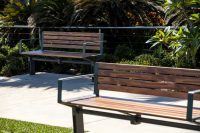 Aria Seat (CMA1) 3-seater with battens in aluminium woodgrain Spotted Gum, Textura Woodland Grey frame.