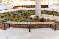 VT Curved Bench (LVB6-C) convex, with hardwood battens, Textura Dark Bronze frame.
