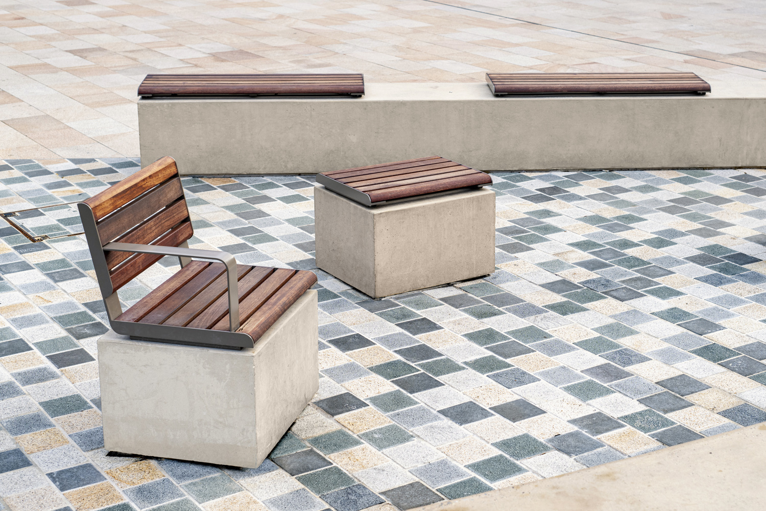 Linea Seats and Benches (600mm, 1200mm) plinth-fixed with hardwood battens, Jasper frames.