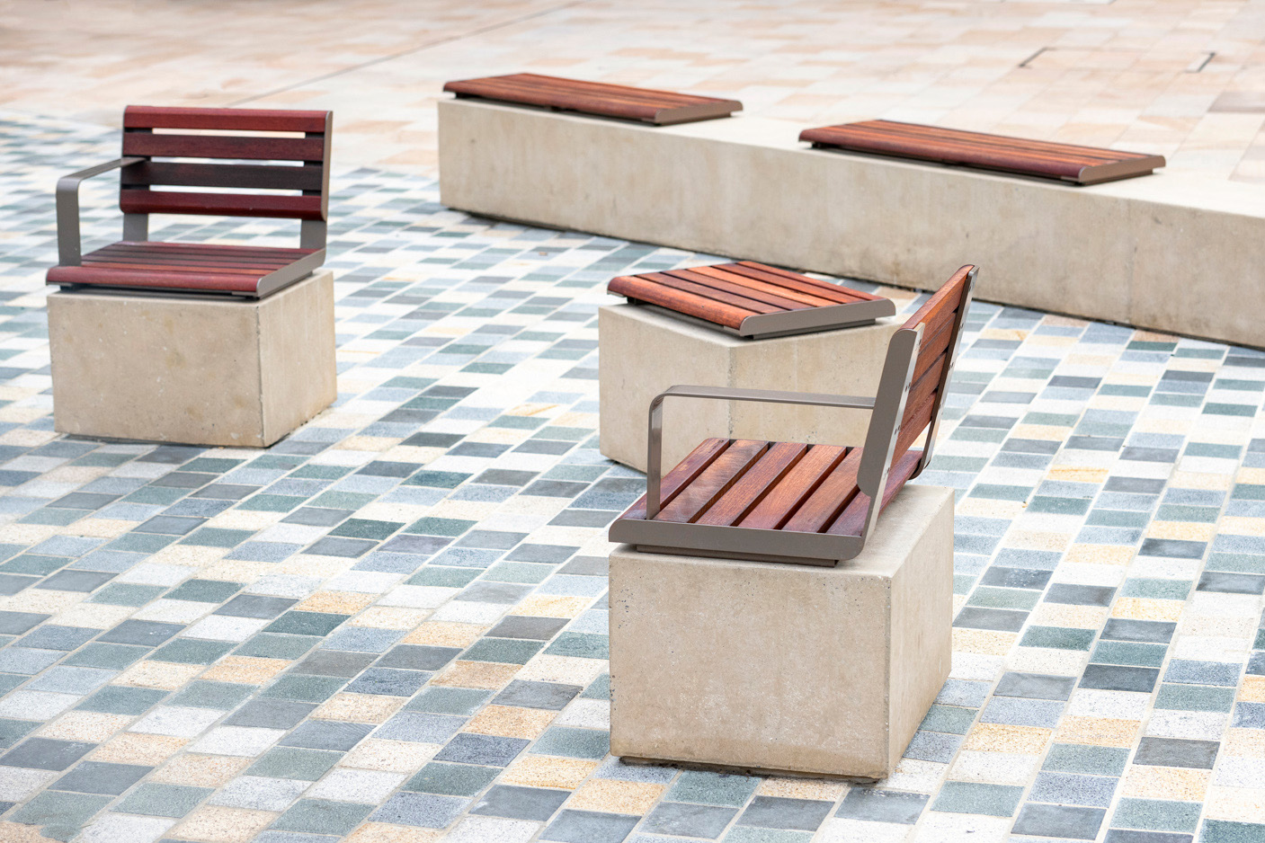 Linea Seats and Benches (600mm, 1200mm) plinth-fixed with hardwood battens, Jasper frames.