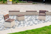 Linea Seats and Benches (600mm, 1200mm) plinth-fixed with hardwood battens, Jasper frames.
