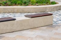Linea Benches (LIB6, 1200mm) plinth-fixed with hardwood battens, Jasper frames.