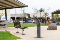 Arqua Fountain in tailored Metropolis Storm Grey. Mall DDA Seat with Jarrah battens.