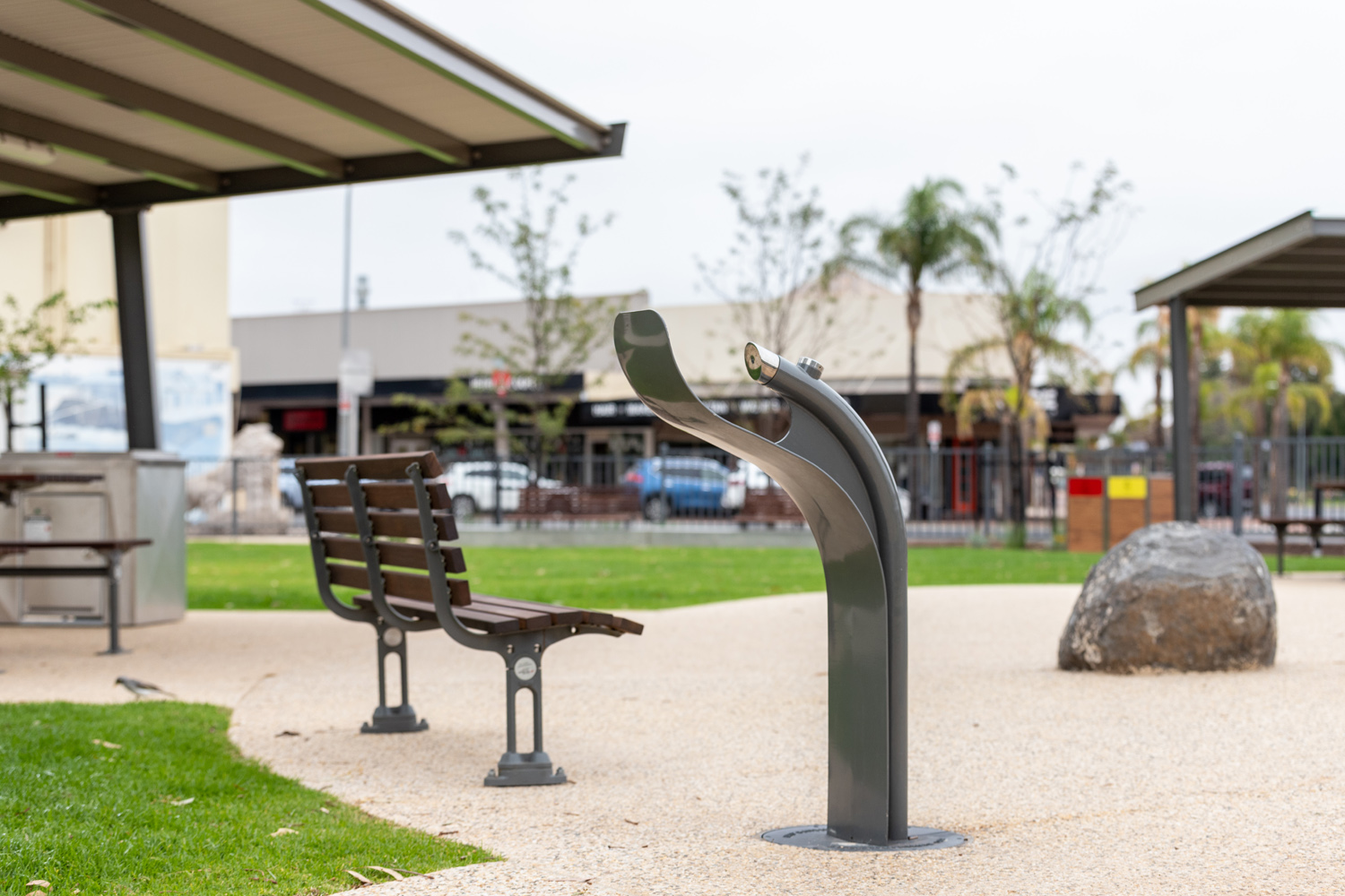 Arqua Fountain in tailored Metropolis Storm Grey. Mall DDA Seat with Jarrah battens.