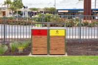 Frame Bin Enclosure with custom battened body in aluminium woodgrain in Spotted Gum.
