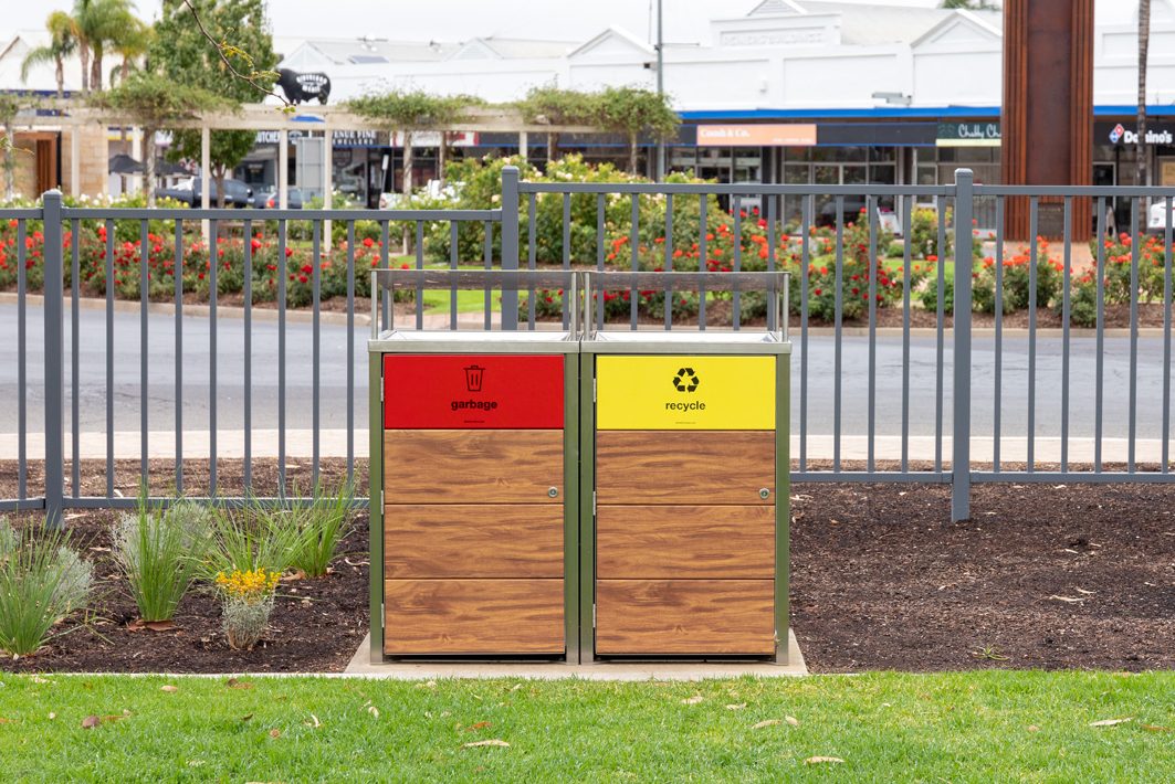 Frame Bin Enclosure with custom battened body in aluminium woodgrain in Spotted Gum.