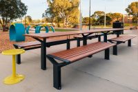 Aria Long Communal Table (CMA6-L) with aluminium Spotted Gum battens, Textura Monument frames.