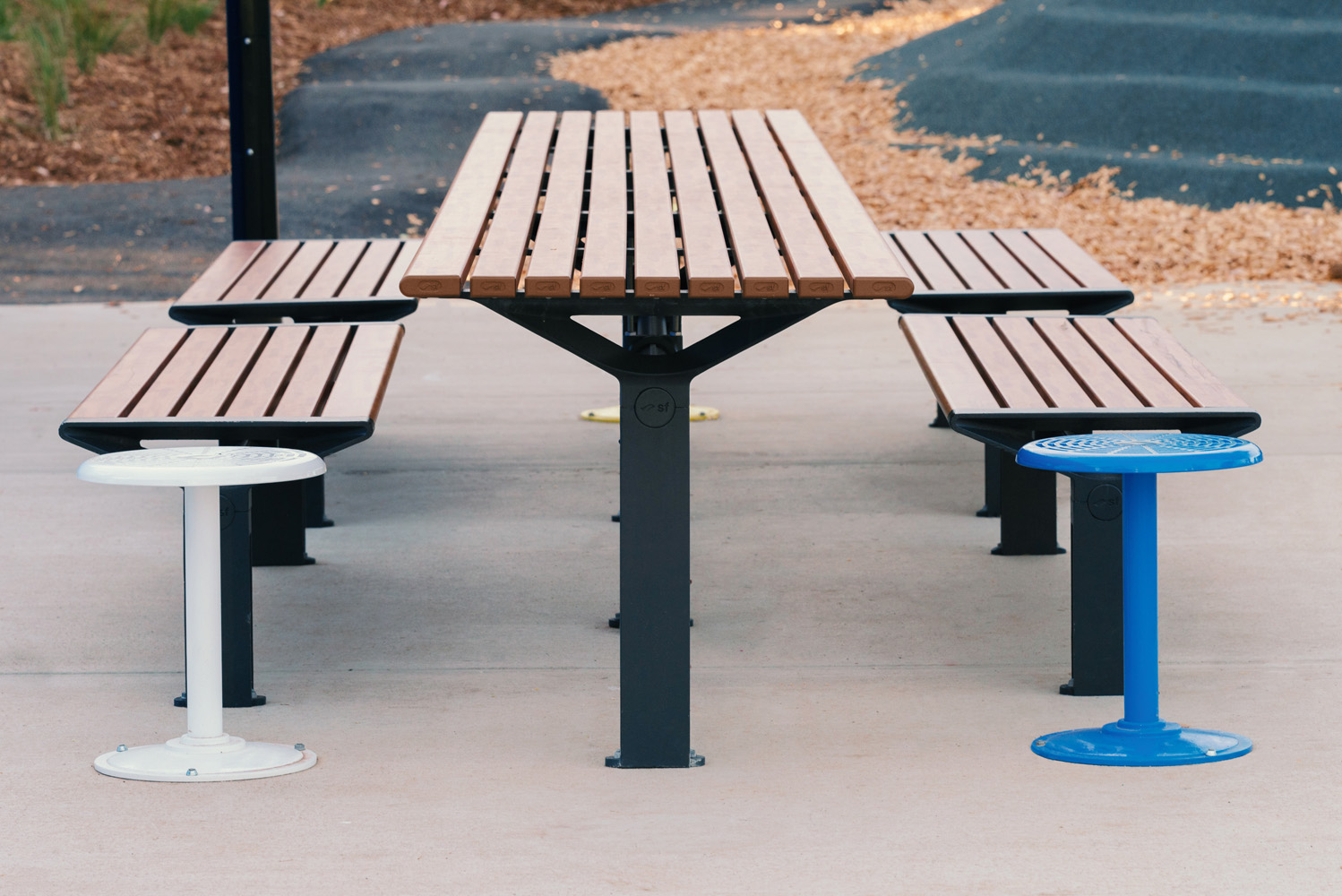 Aria Long Communal Table (CMA6-L) with aluminium Spotted Gum battens, Textura Monument frames.