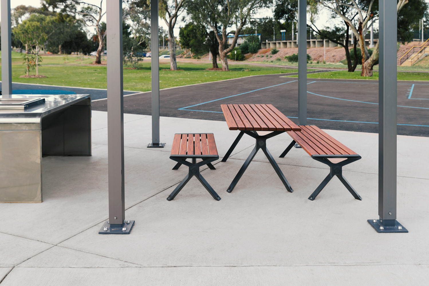 Aria picnic setting (CMA6 and CMA4) with aluminium Spotted Gum battens, Textura Monument frames.