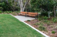 Linea Seat (LIS10) 1800mm with aluminium woodgrain Spotted Gum battens, Monument frame.