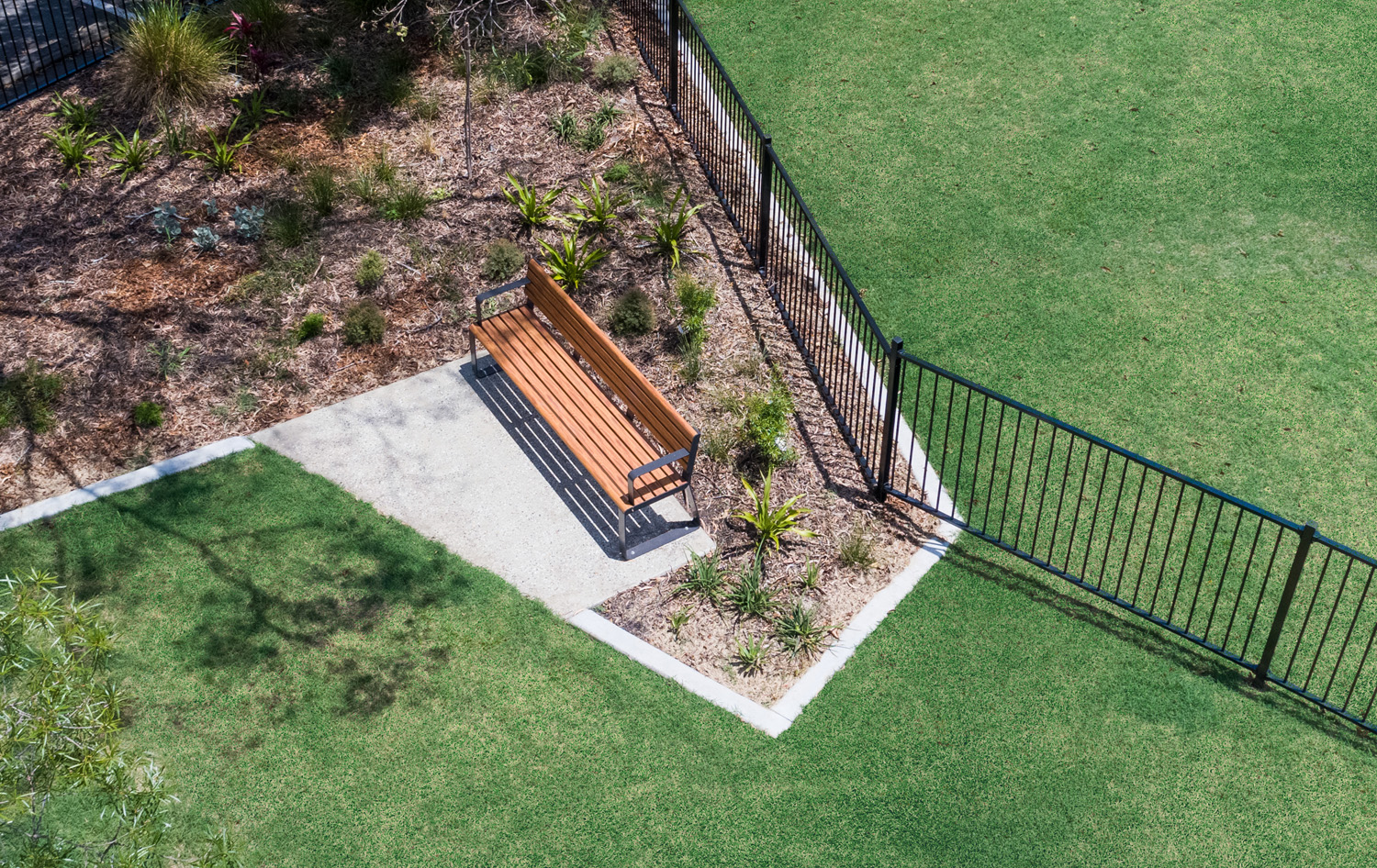 Linea Seat (LIS10) 1800mm with aluminium woodgrain Spotted Gum battens, Monument frame.