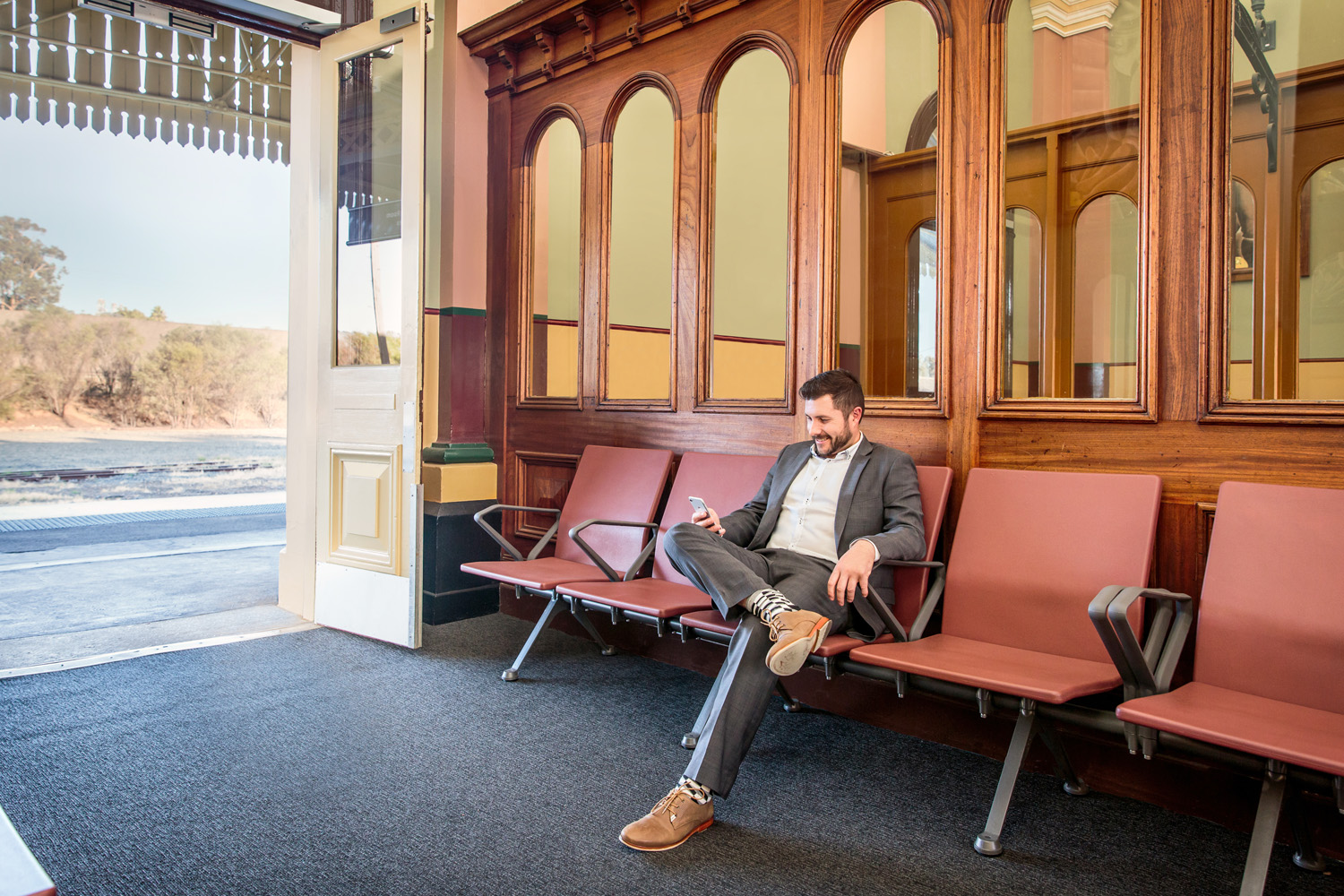 Termini's high armrests make it easy to sit and stand.