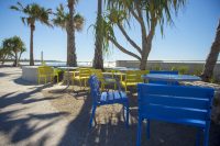 Forum Seats and Cafe Tables in Bondi Blue, Brilliant Yellow and Palladium Silver.