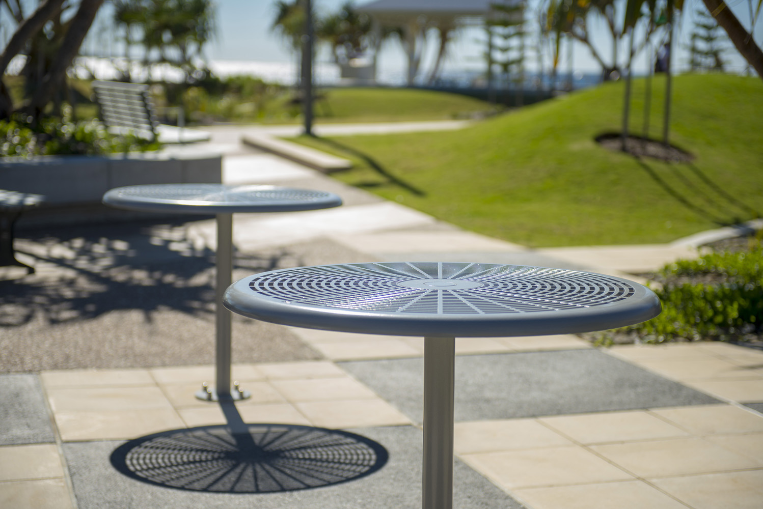 Cafe Tables powdercoated in Palladium Silver.