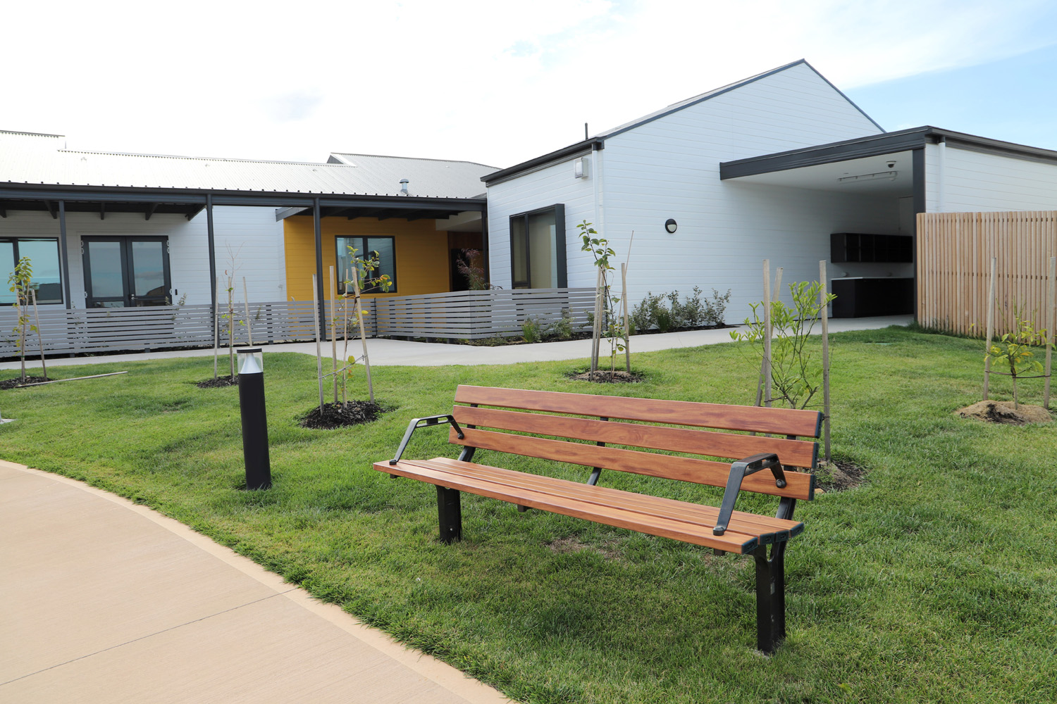 Park DDA Seats (PS7-DDA) with aluminium woodgrain Spotted Gum battens, Night Sky frames.