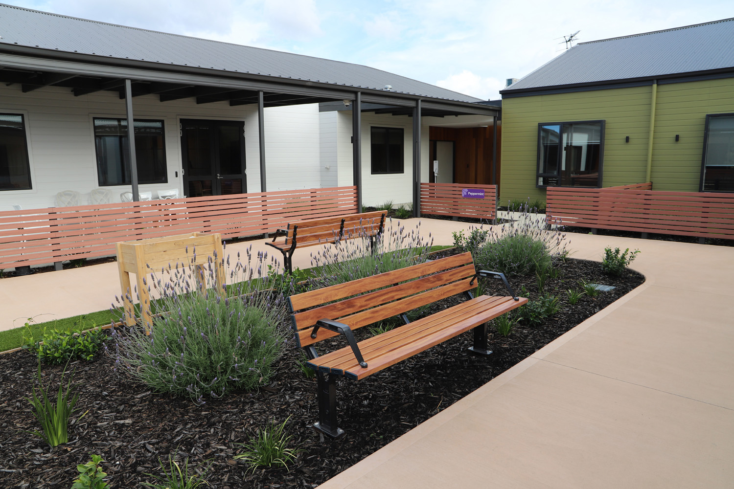 Park DDA Seats (PS7-DDA) with aluminium woodgrain Spotted Gum battens, Night Sky frames.
