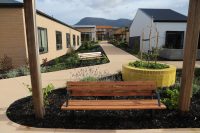 Park DDA Seats (PS7-DDA) with aluminium woodgrain Spotted Gum battens, Night Sky frames.