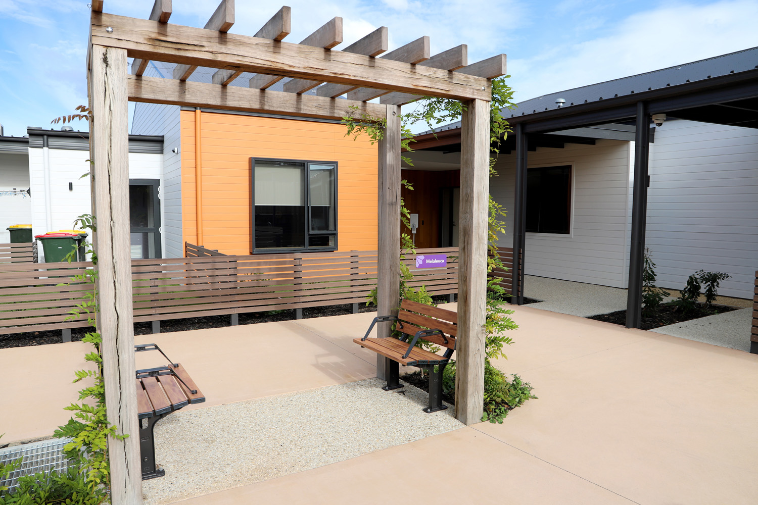 Park DDA Seats (PS7-DDA) with aluminium woodgrain Spotted Gum battens, Night Sky frames.
