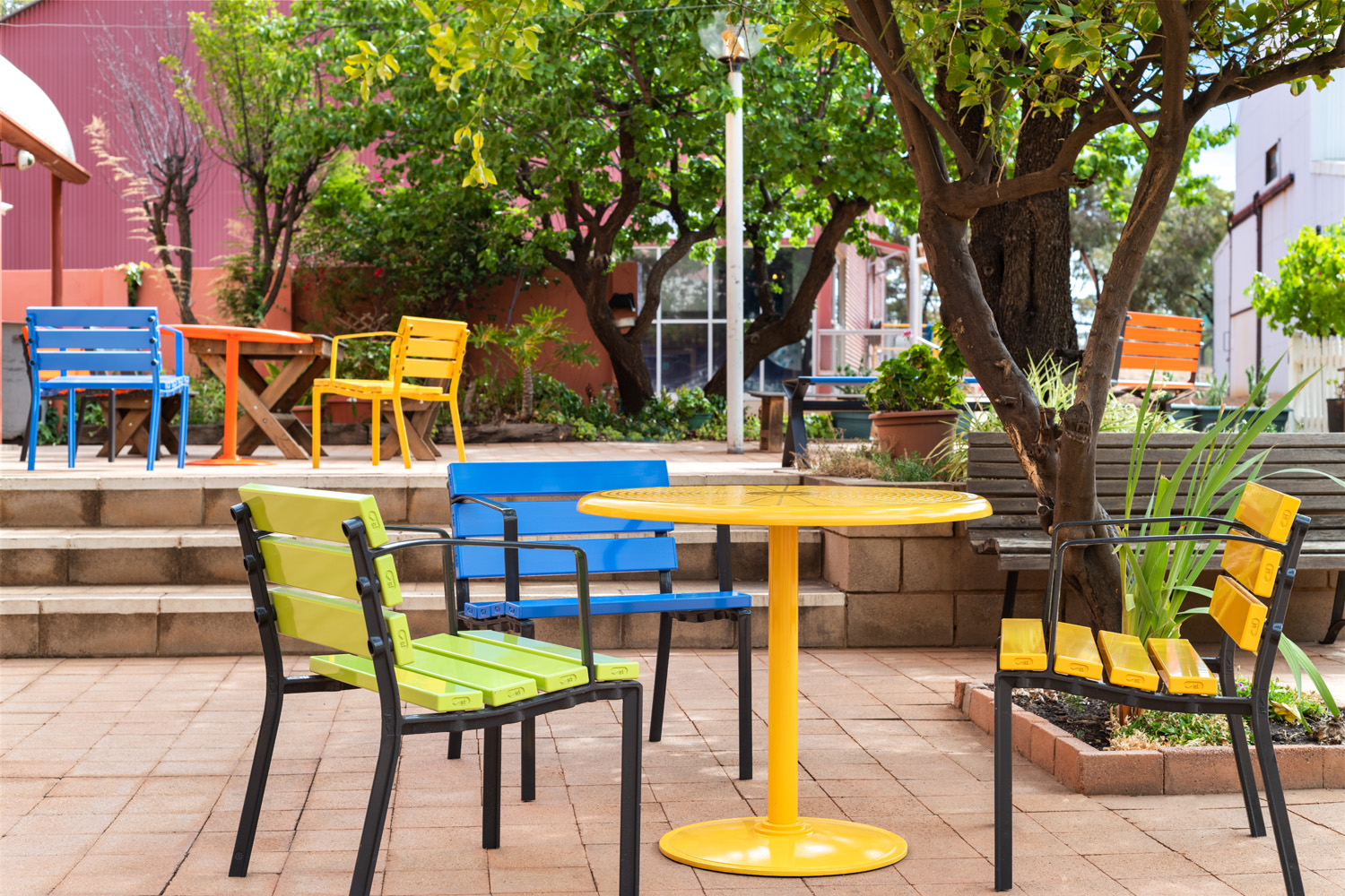 Cafe Round Table and Forum Seats in Lycra Strip, Sunshine and Bondi Blue, with Textura Monument frames.
