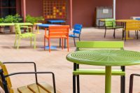 Cafe Round Table and Forum Seats in Lycra Strip, Sunshine, Sensation Orange and Bondi Blue.