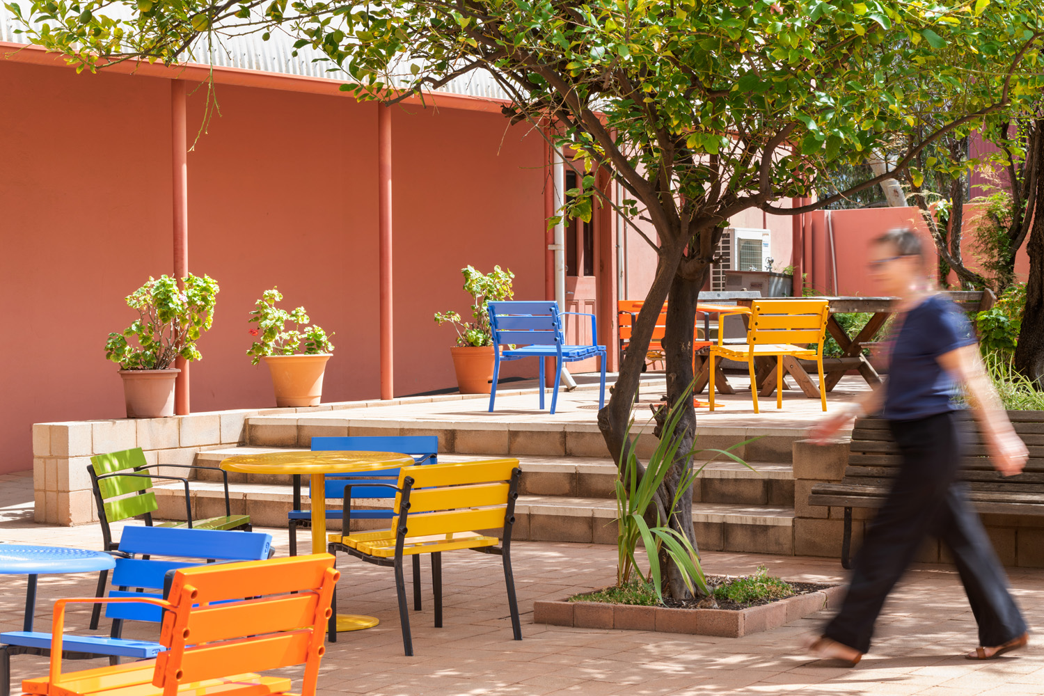 Forum Seats and Cafe Round Tables in Sunshine, Sensation Orange, Bondi Blue and Lycra Strip.