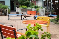 Aria Seat, Forum Seat and Cafe Round Table in Sensation Orange, Bondi Blue and Sunshine.