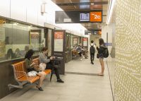 TransLink's bright orange Concourse Seats add warmth and comfort to the refurbished station.