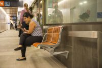 TransLink's bright orange Concourse Seats add warmth and comfort to the refurbished station.